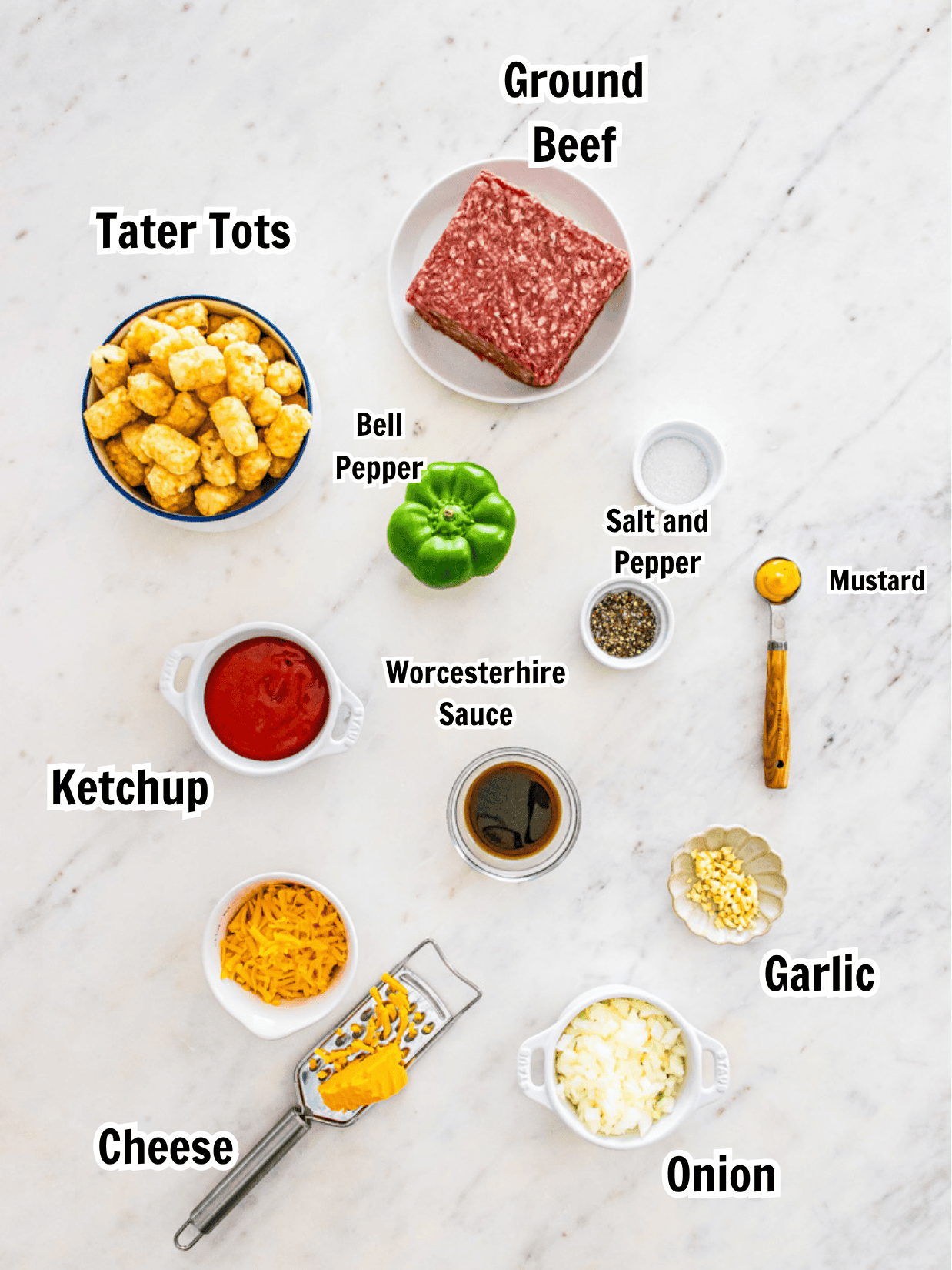 ingredients including ground beef, tater tots, bell pepper, onion, garlic, cheese, ketchup, mustard, and Worcestershire sauce.