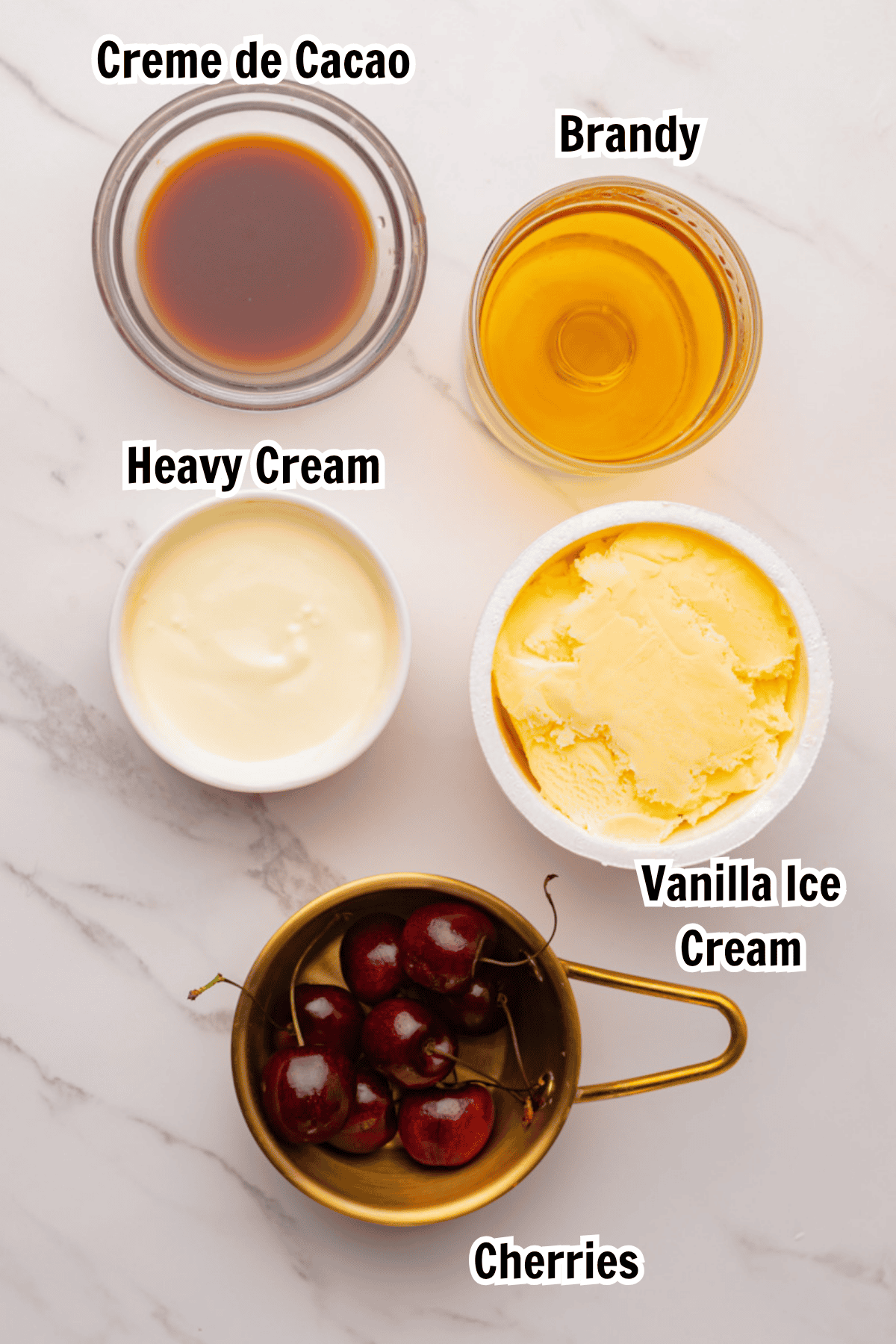 ingredients including brandy, dark creme de cacao, heavy cream, cherries, and French vanilla ice cream.