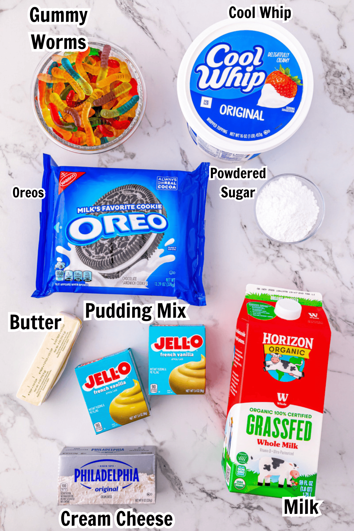 ingredients including Oreos, Cool Whip, gummy worms, French vanilla pudding, powdered sugar, butter, cream cheese, and milk.