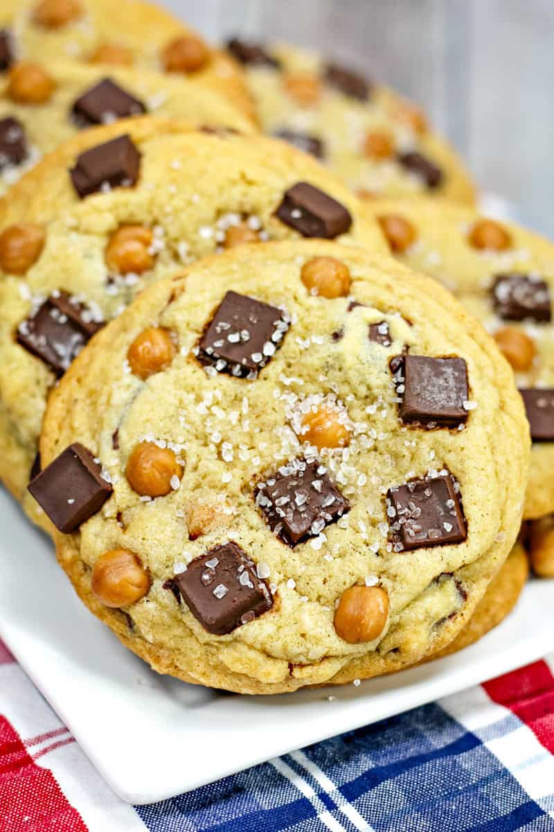a chocolate chunk cookie with caramel bits topped with flaky sea salt.